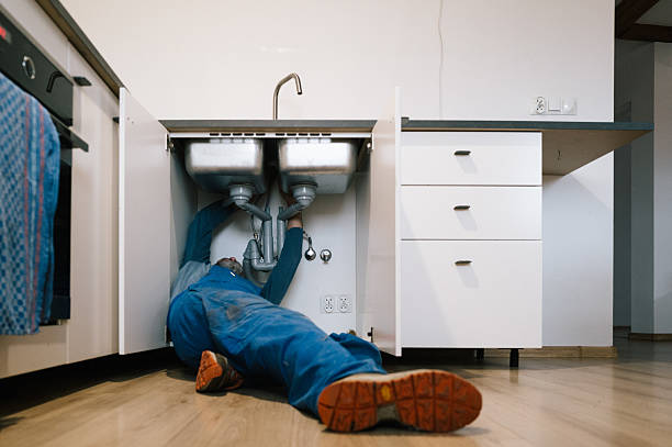 Professional Plumbing technician working in Hamden, CT